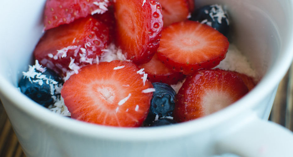 Oatmeal with blueberries, strawberries and coconut